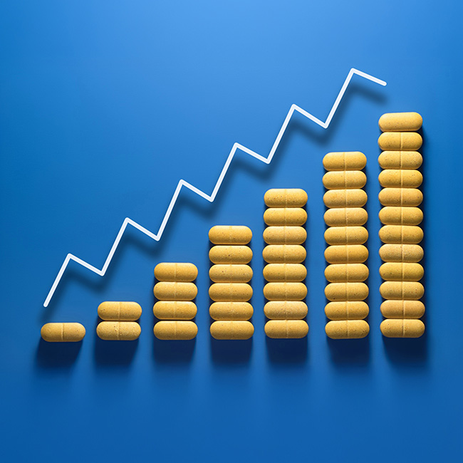 Stacked pills increasing in number forming a bar graph