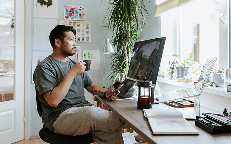 Man sitting at desk in home office