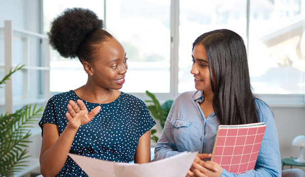 Two women in a work conversation